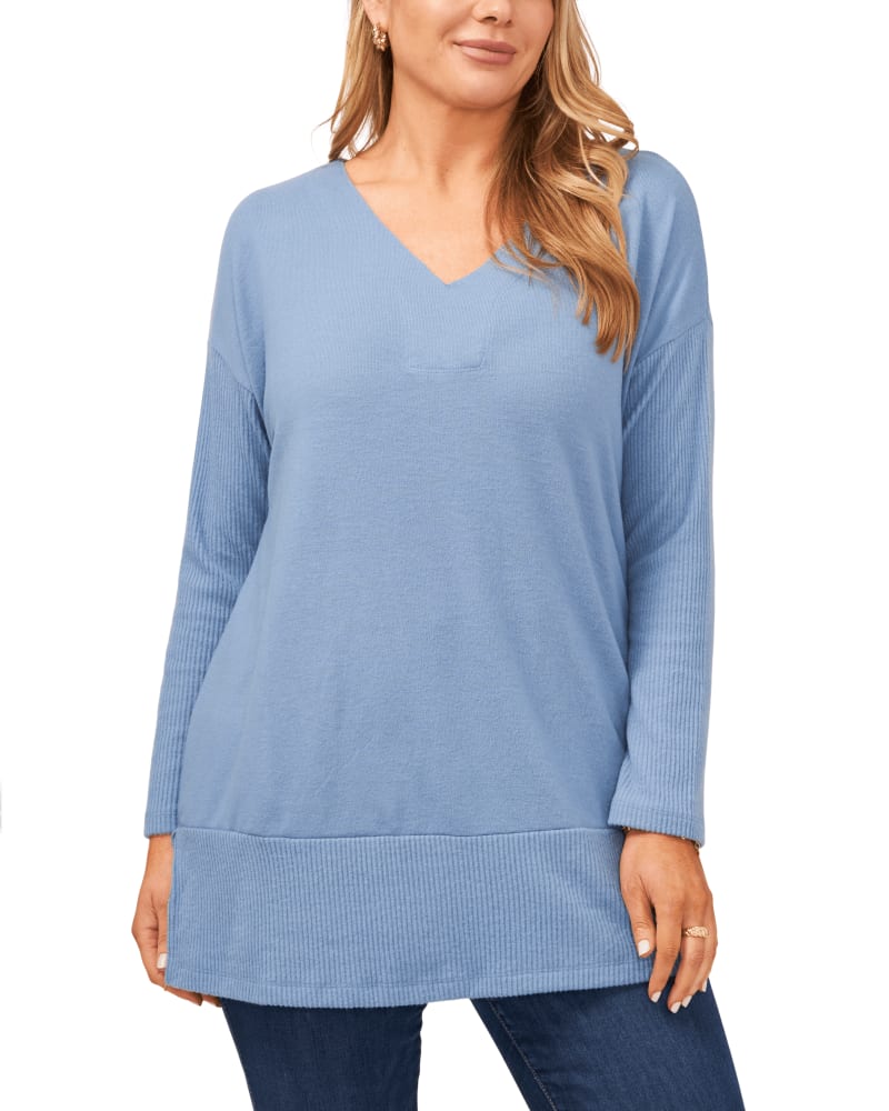 Front of a model wearing a size 1X Gianna Tunic Sweater in CANYON BLUE by Vince Camuto. | dia_product_style_image_id:261354